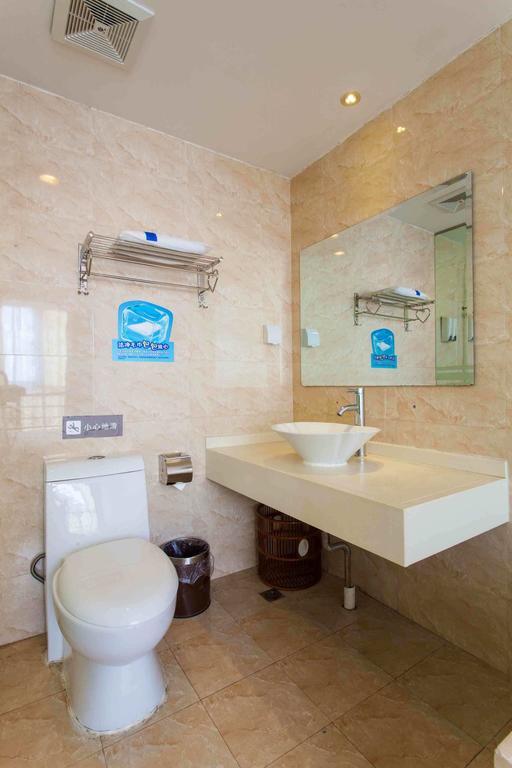 7Days Inn Haikou Hong Kong City Rum bild