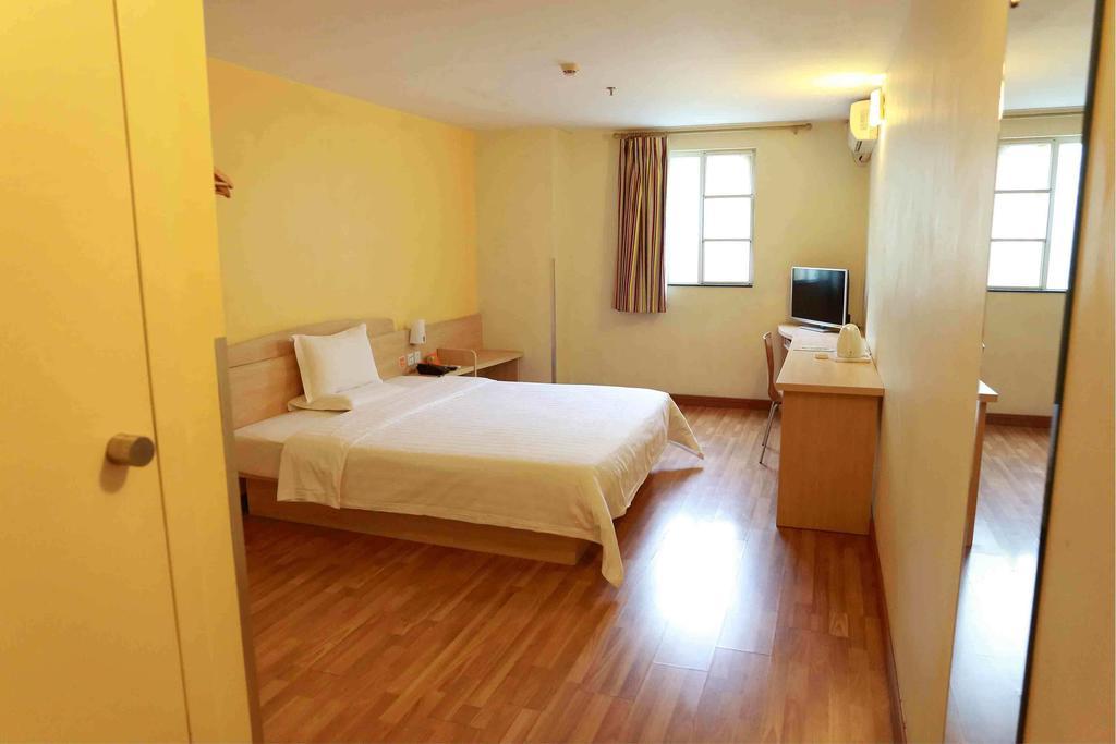 7Days Inn Haikou Hong Kong City Rum bild